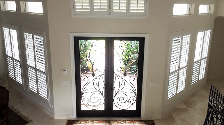 Boise foyer with glass doors and interior shutters